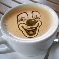 Clown face on a coffee