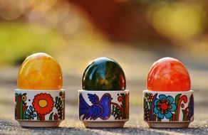 shiny Easter eggs in beautiful stands