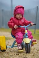Girl on the small bike