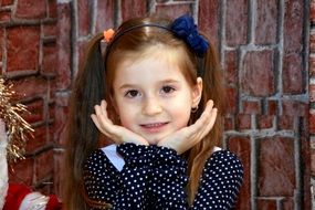 portrait of a little girl with long hair