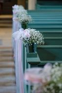 floral decoration on the stairs at the wedding