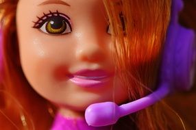 doll with headphones with microphone