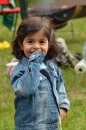 little smiling girl on a picnic