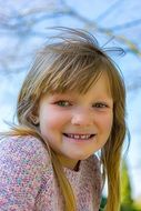photo of a laughing blond girl