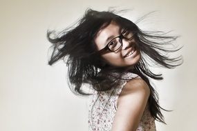 girl with long hair in glasses