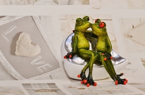 ceramic frog figures kissing