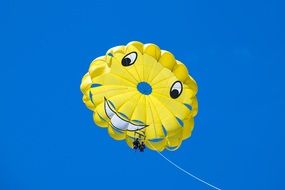 Yellow smiling parachute