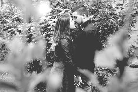 loving couple in the garden in black and white background