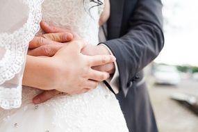 bride groomis holding hands in Istanbul