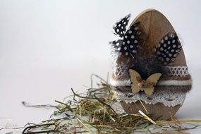 fancy easter wooden egg and grass