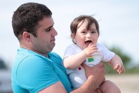 father with cute baby girl