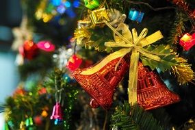 red bells as a decoration for the Christmas tree