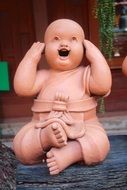 stone figure of Buddha in garden