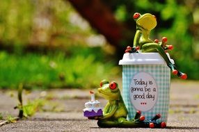 figures of frogs with good day wishes