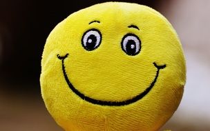 yellow ball with a good smile