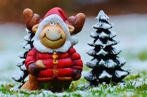 ceramic figure of a moose in a jacket