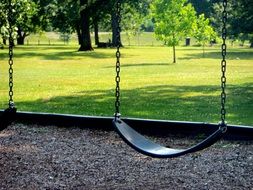 swing at the playground in the park