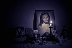 altar with Jesus and candle