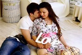 photo of husband and pregnant wife
