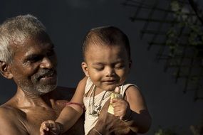 Portrait of a child and grandpa