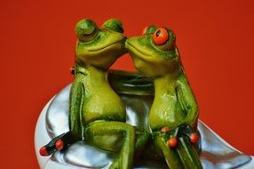 green frogs in love