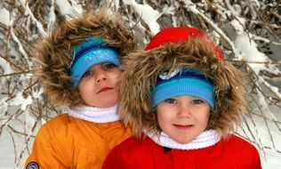 portrait of twins in the winter landscape