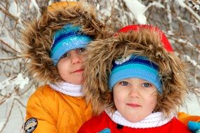brothers in winter jackets close up