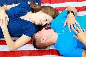 happy couple on american flag