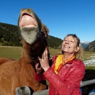 Woman with the horse in South Tyrol