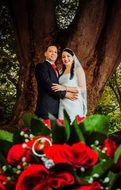 newlyweds on a photo shoot in nature