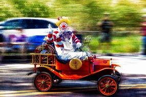 clown rides a car