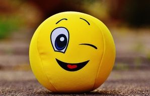 ball with a smiley on the ground