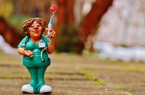 comic figure of a nurse with a syringe