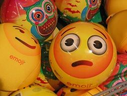 yellow balls with funny faces