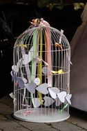 vintage birdcage decorated with ribbons and hearts, Wedding Symbol