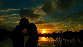 couple in love at romantic beautiful sunset