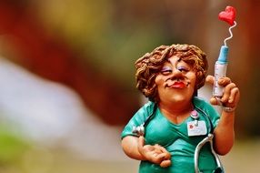 funny nurse with a syringe close-up
