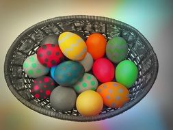 colorful eggs with pattern in basket