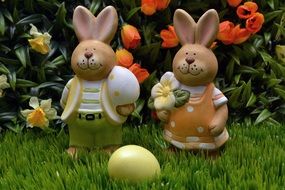 Easter bunnies on green grass