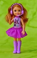 little doll in a purple dress
