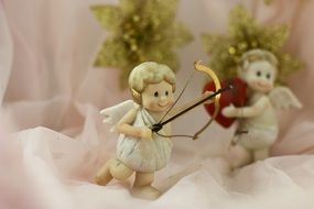 figures of angels as a symbol of merry christmas