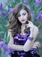 portrait of a girl on a background of purple flowers