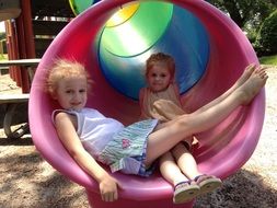 girls on the playground in summer