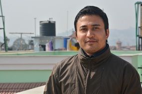 portrait of a young man on the streets of Nepal