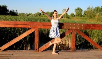 barefoot girl on the bridge in summers