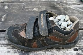 pebbles in children's shoes