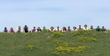 people over the green hill