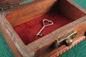 the key lies in a wooden box