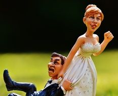 funny figures of a bride with groom