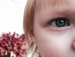 face of a little girl with white hair